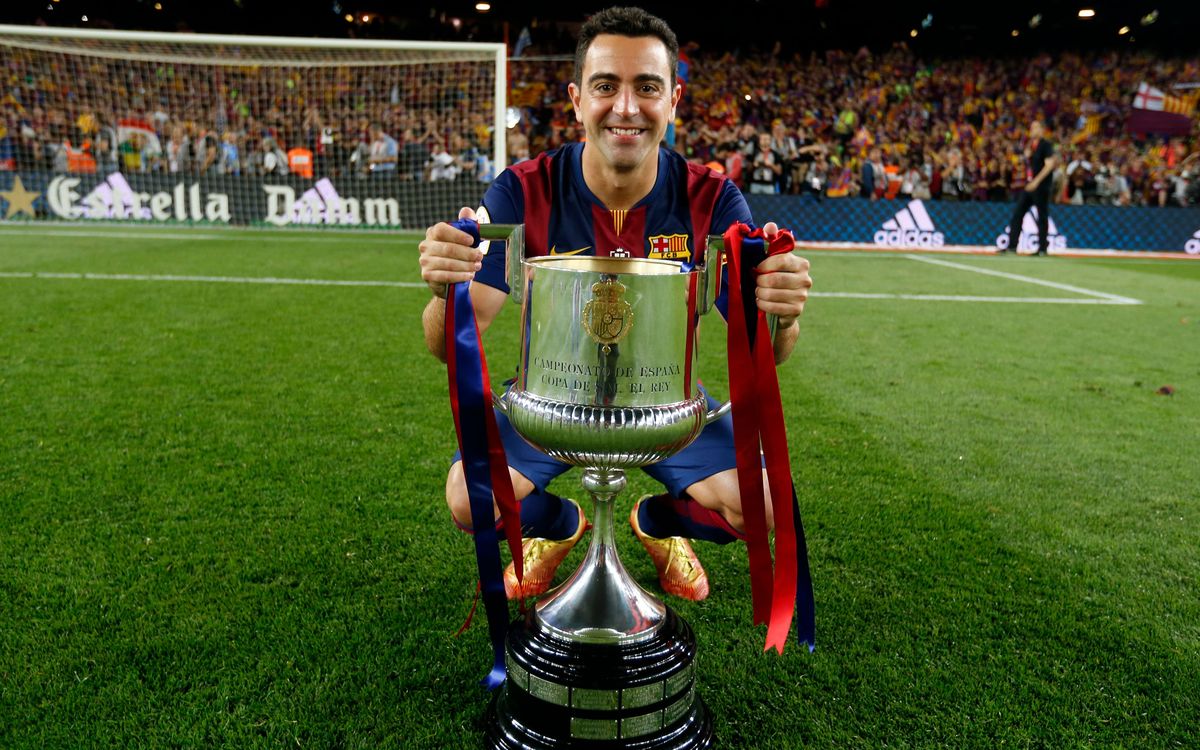 Xavi bids goodbye to Camp Nou lifting the Cup