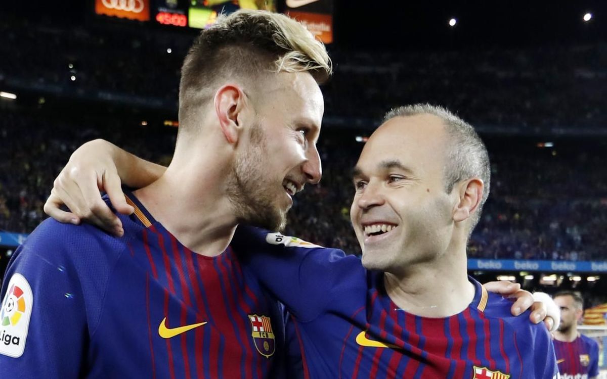 Rakitic e Iniesta.
