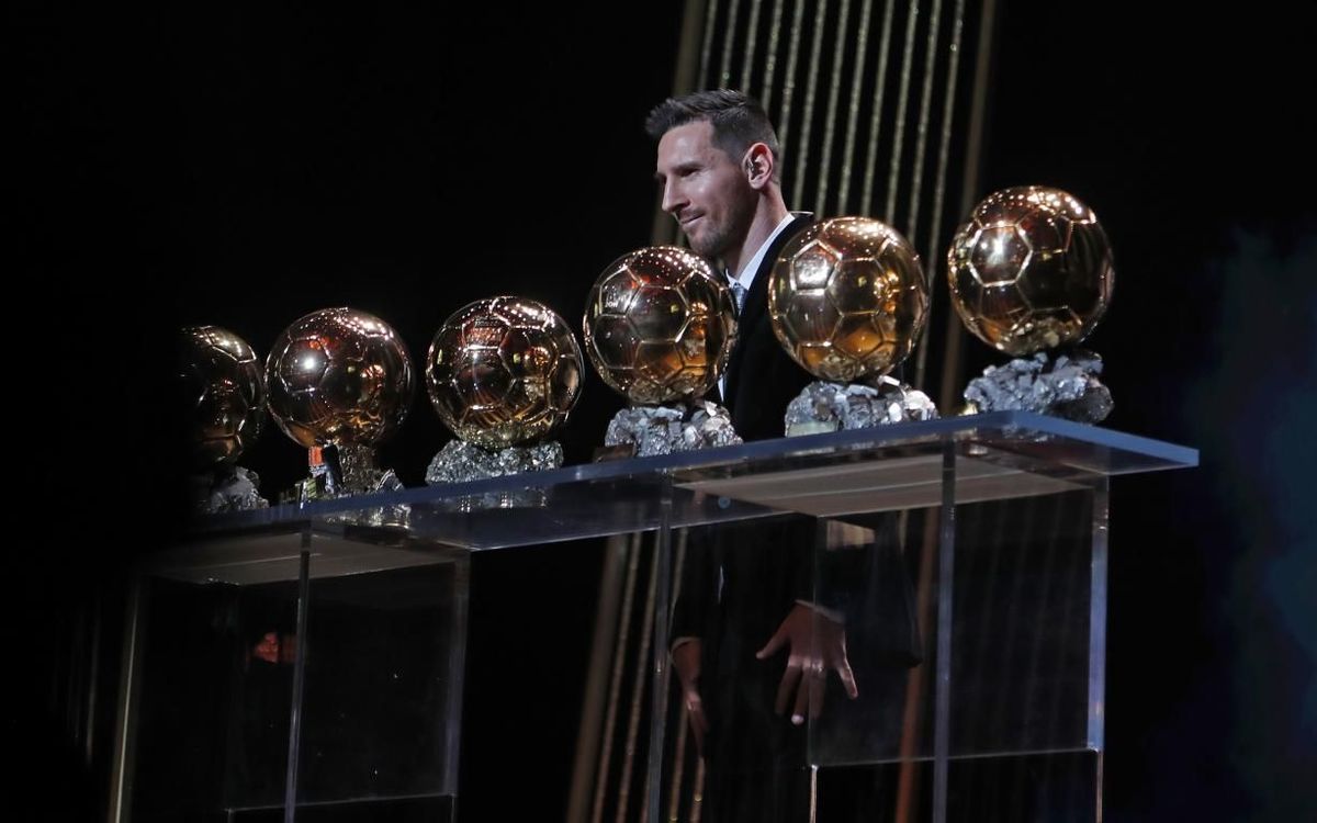 Messi with his Ballon d'Or awards.