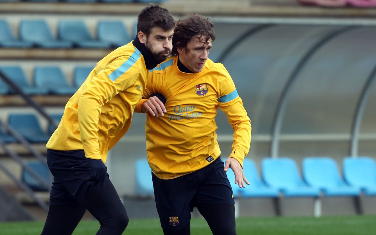 Piqué y Puyol, juntos en un entrenamiento.