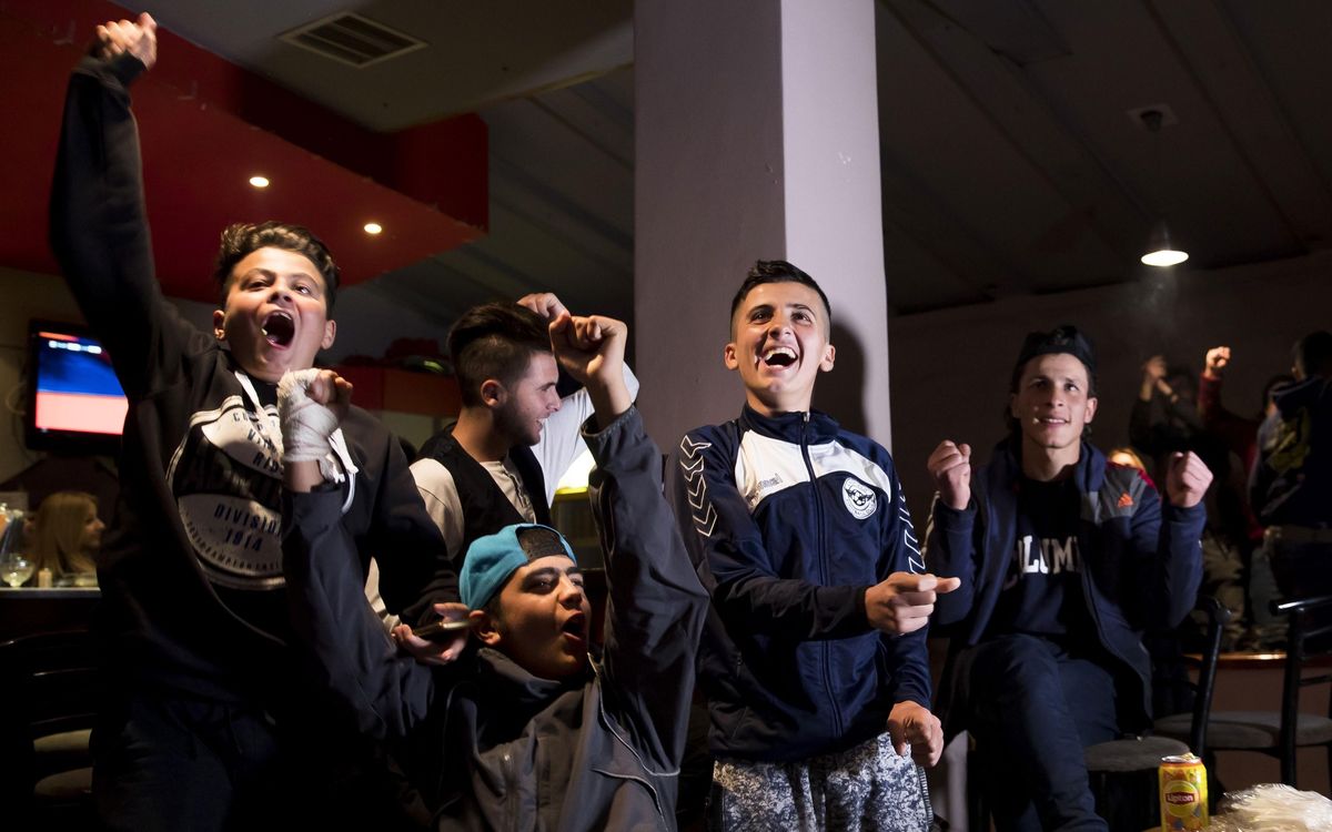 Champions League night, outside a refugee camp