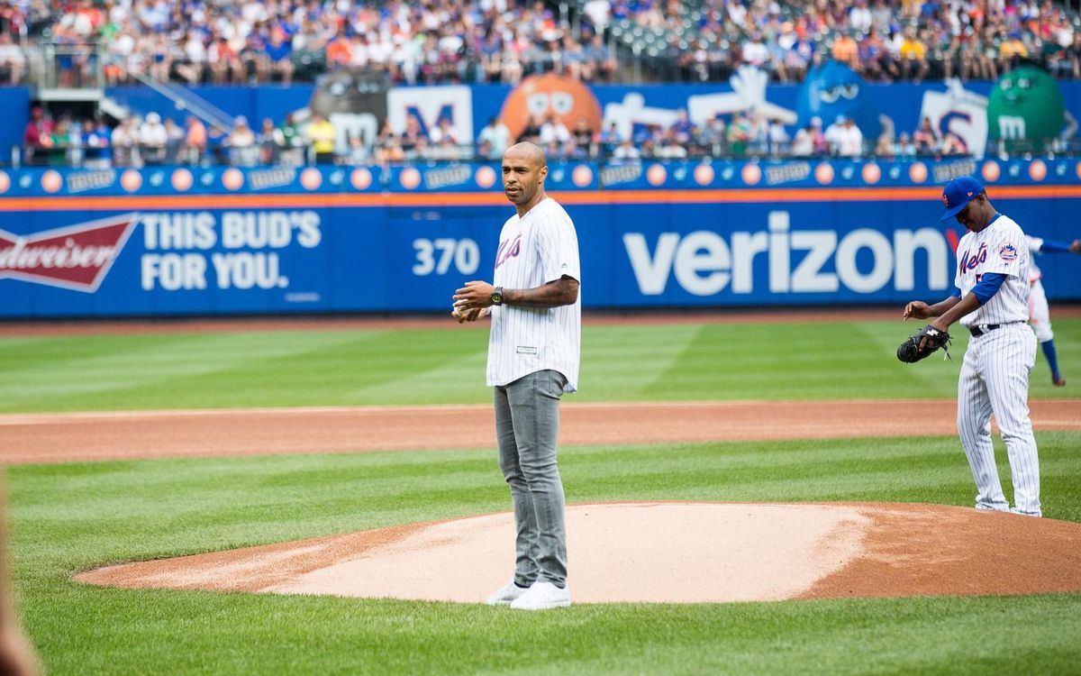 FC Barcelona Legend Thierry Henry throws out first pitch before New York Mets game at Citi Field